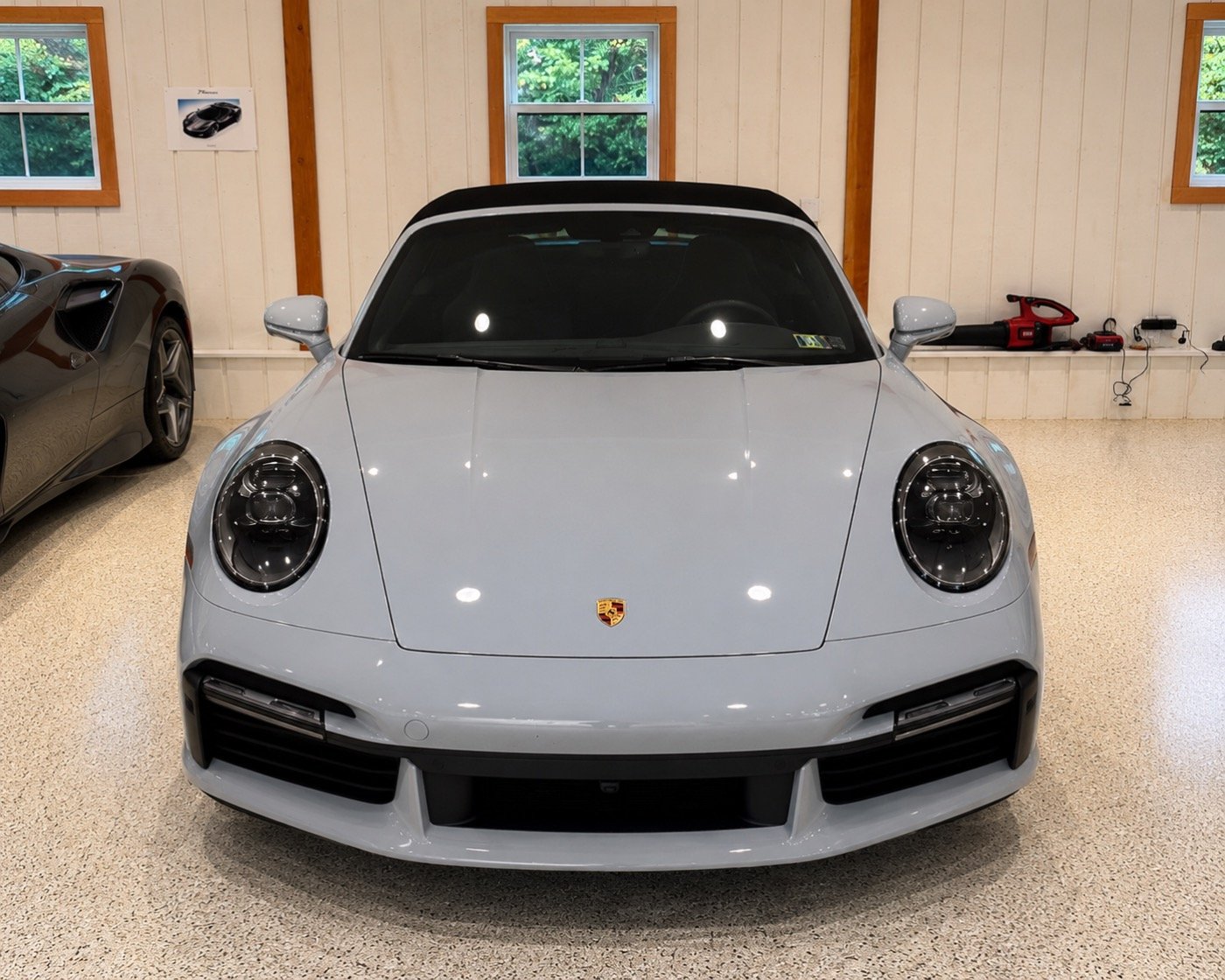 White Porsche 911 with freshly ceramic coated, glossy paint