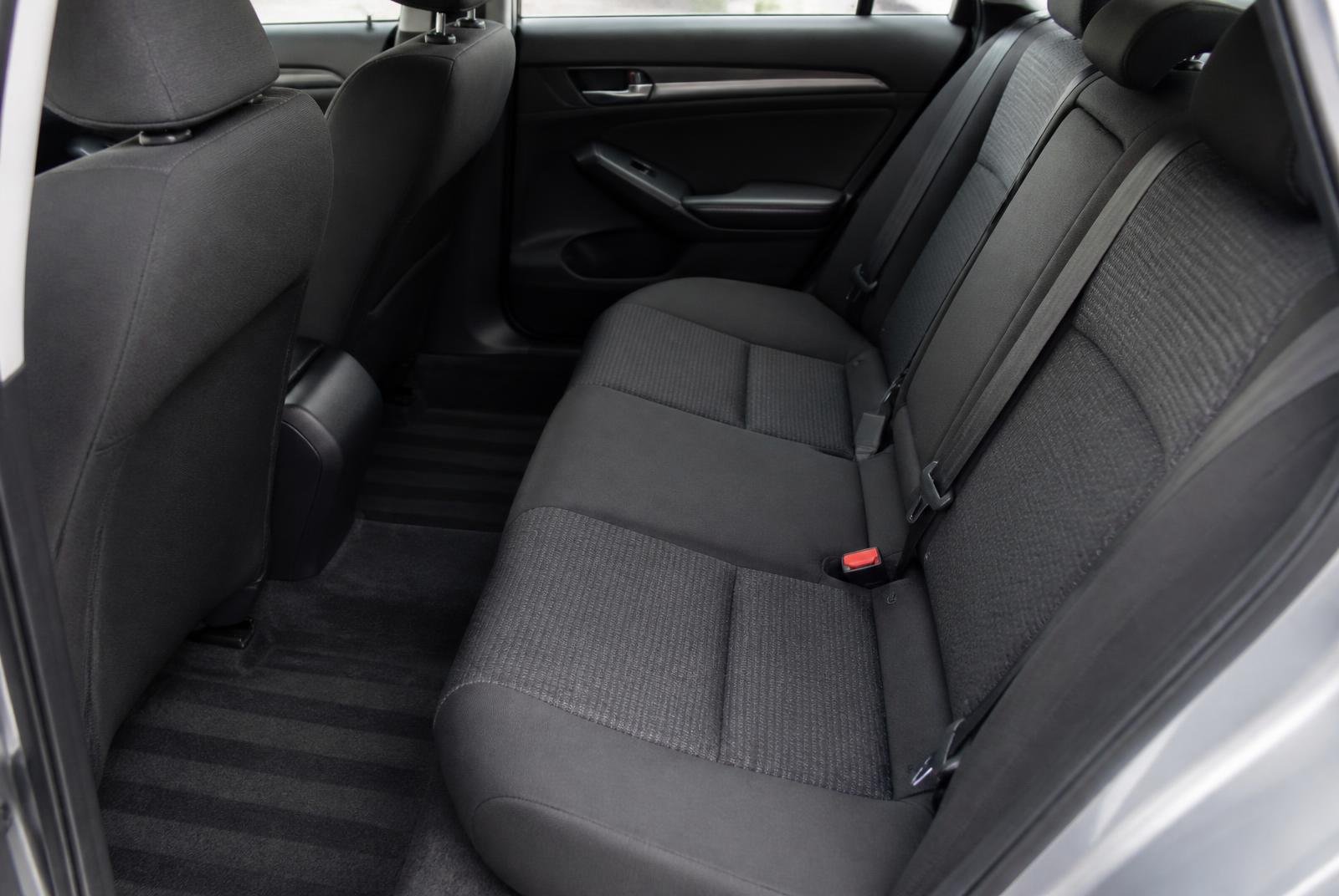 Freshly cleaned rear seats and vacuumed carpet of a sedan